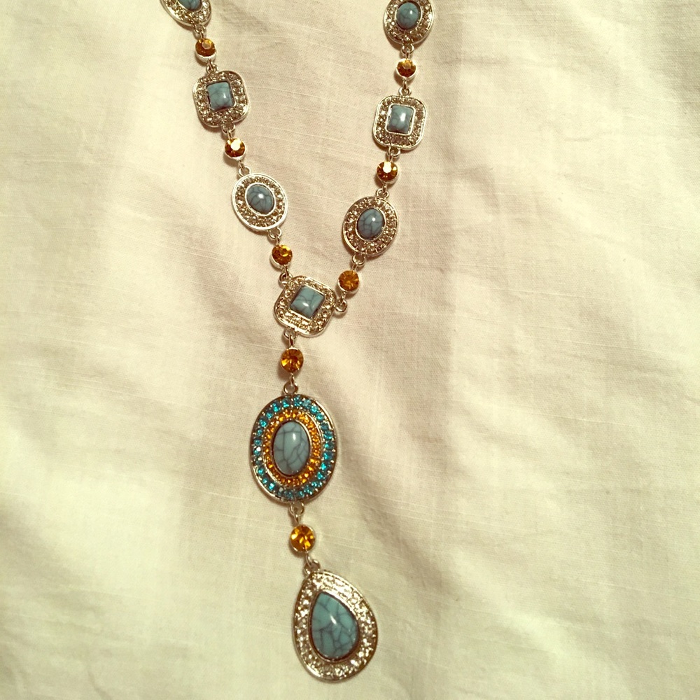 Silver necklace.
